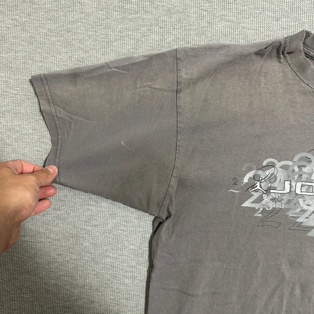 Jordan Brand Y2K Number 23 Jumpman All Over Graphic V-Neck Tee Faded Gray Medium